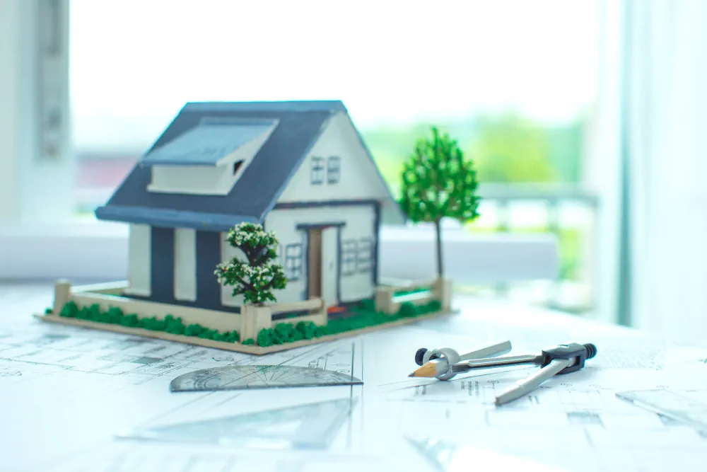 Architectural home model representing dream home planning